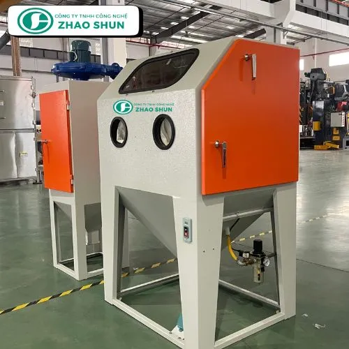 Máy phun cát làm sạch bề mặt kim loại